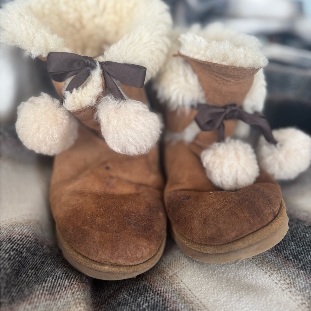 Cozy Shearling-Lined Brown Boots with Pom Poms
